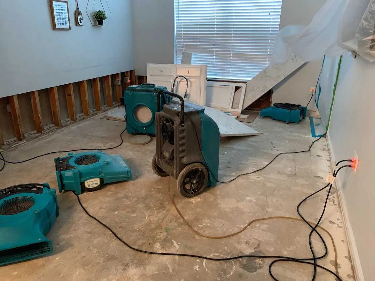 Dehumidifier in flood-cut room for Water Damage Restoration in Humboldt